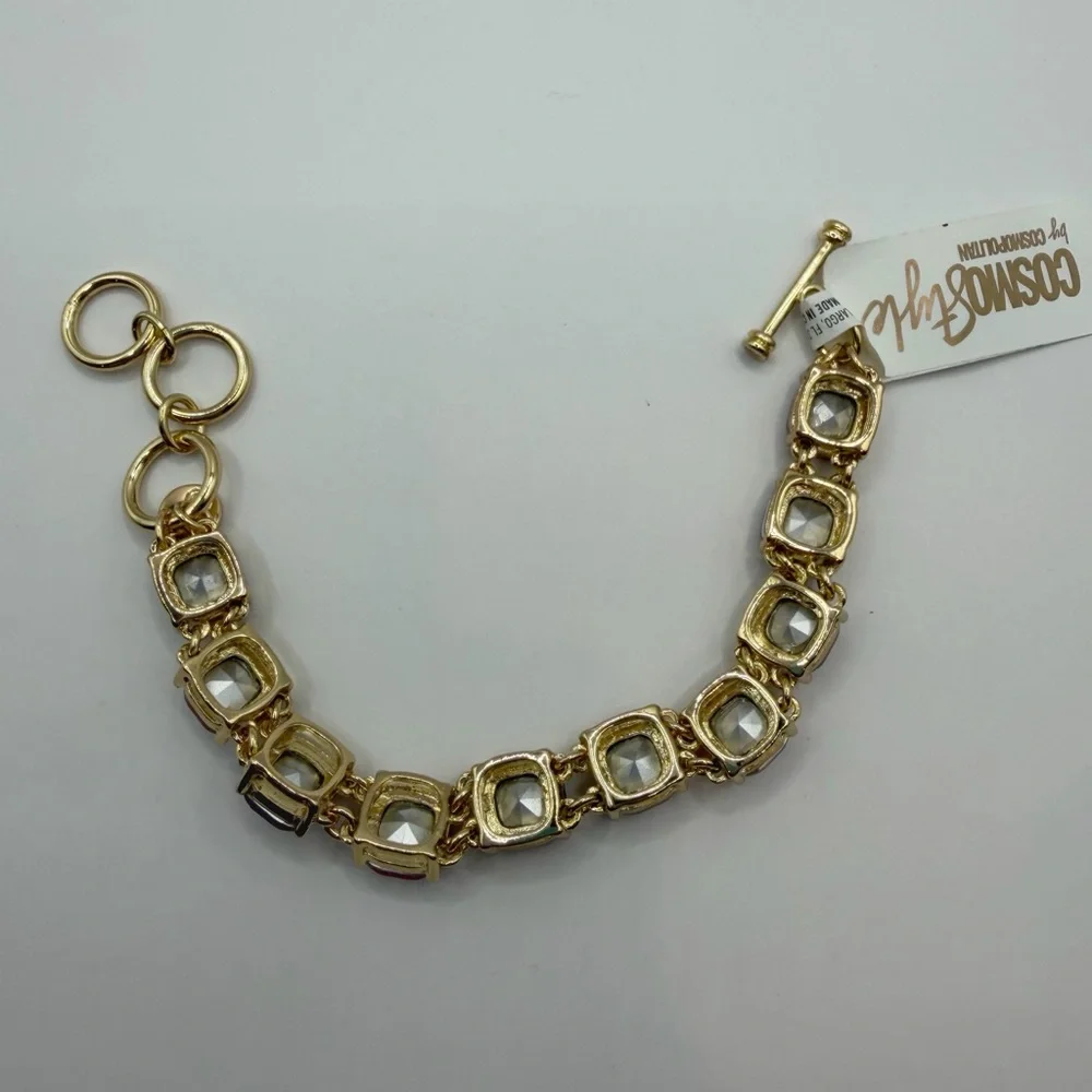 Cosmopolitan Gold Tone Red Crystal Bracelet | Cushion Cut Toggle Clasp